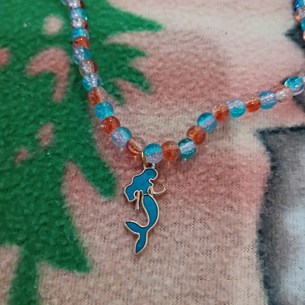 Handmade Blue and Orange Glass Beaded Necklace with Blue Mermaid Pendant $15